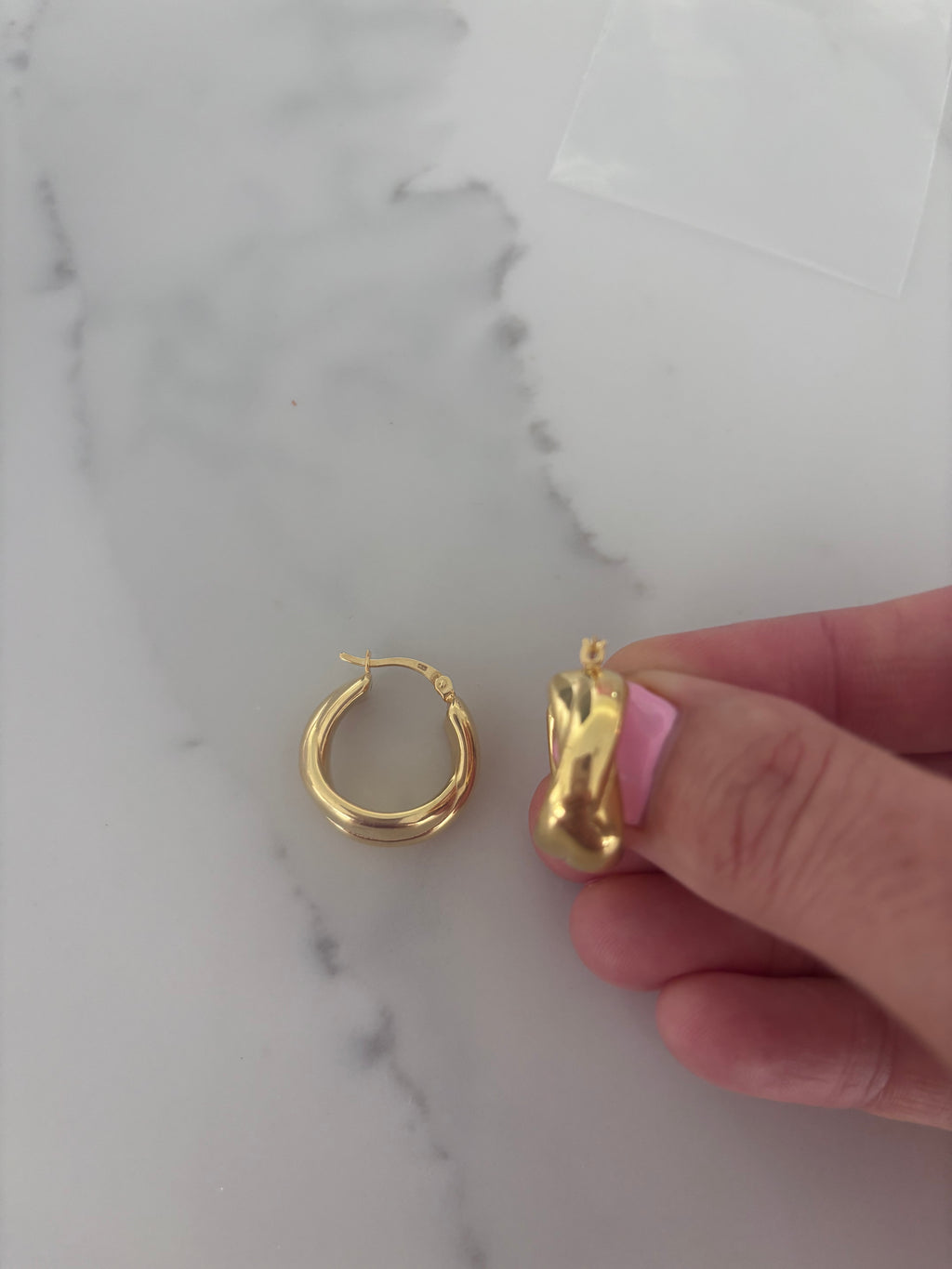 Mercedes gold-coloured chunky crossover hoop earrings by Joi Jewels