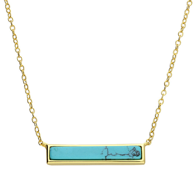 Azure sterling silver with gold vermeil necklace. Featuring a turquoise coloured pendant on a fine gold chain from Joi Jewels. 