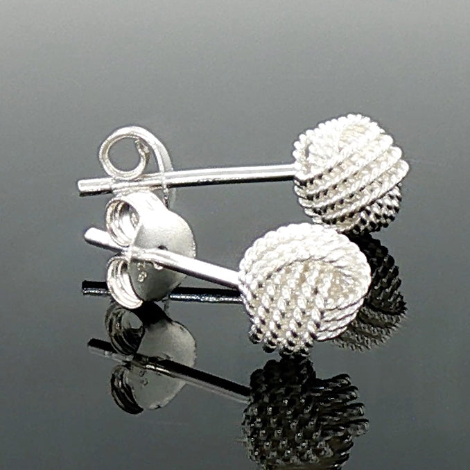 Niamh textured silver knot stud earrings with butterfly backs