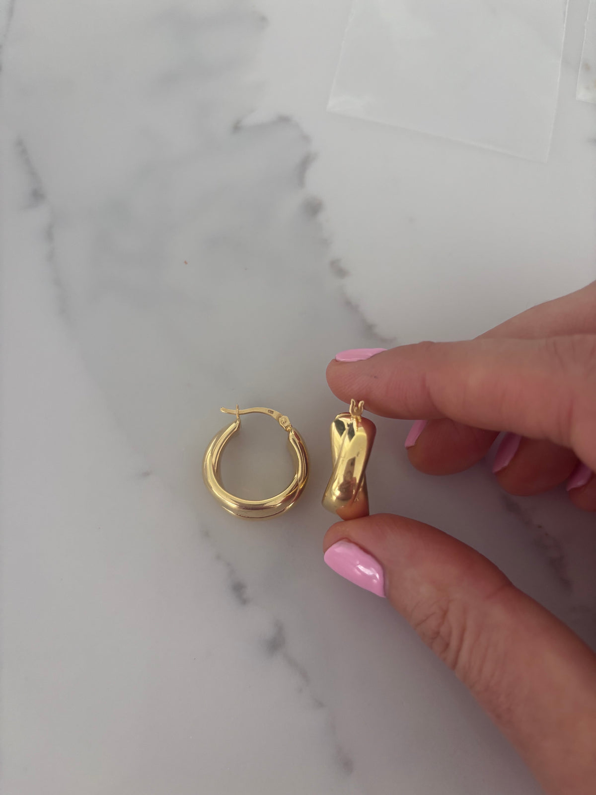 Mercedes gold-coloured chunky crossover hoop earrings by Joi Jewels