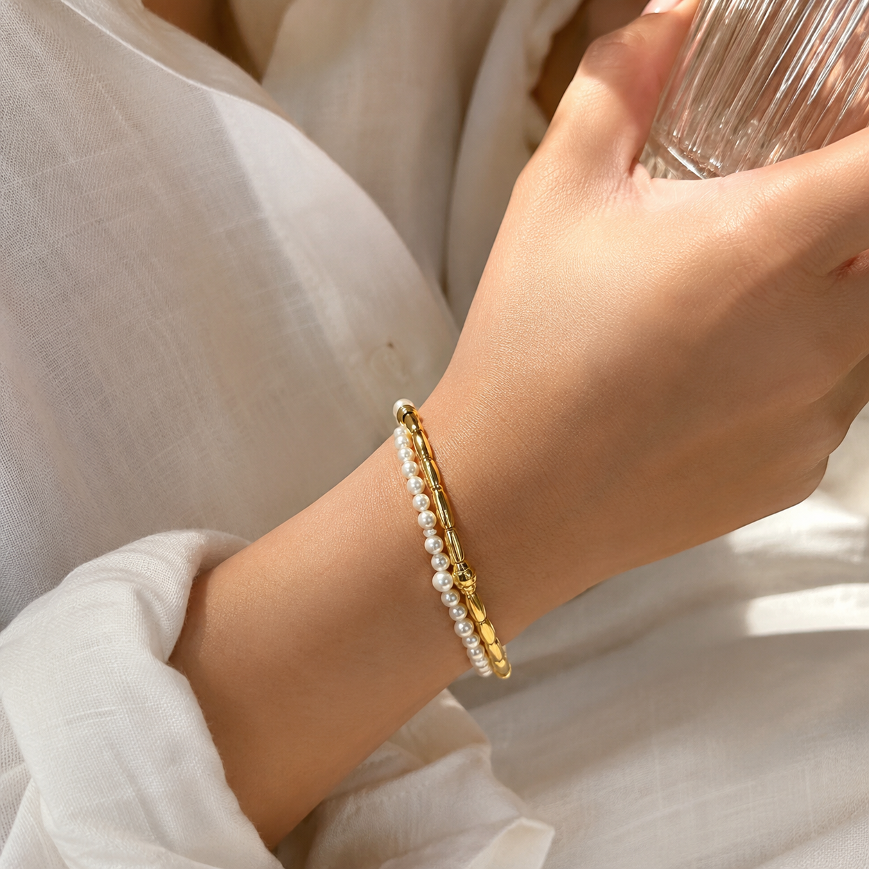 Gold pearl adjustable bracelet with modern link detailing by Joi Jewels 