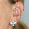 Eternity large sterling silver stud earring worn on ear showing statement size 