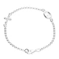 Sterling Silver bracelet with a cross charm and Miraculous Medal on a white background